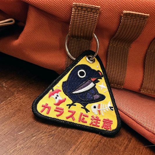 Cawtion Keychain