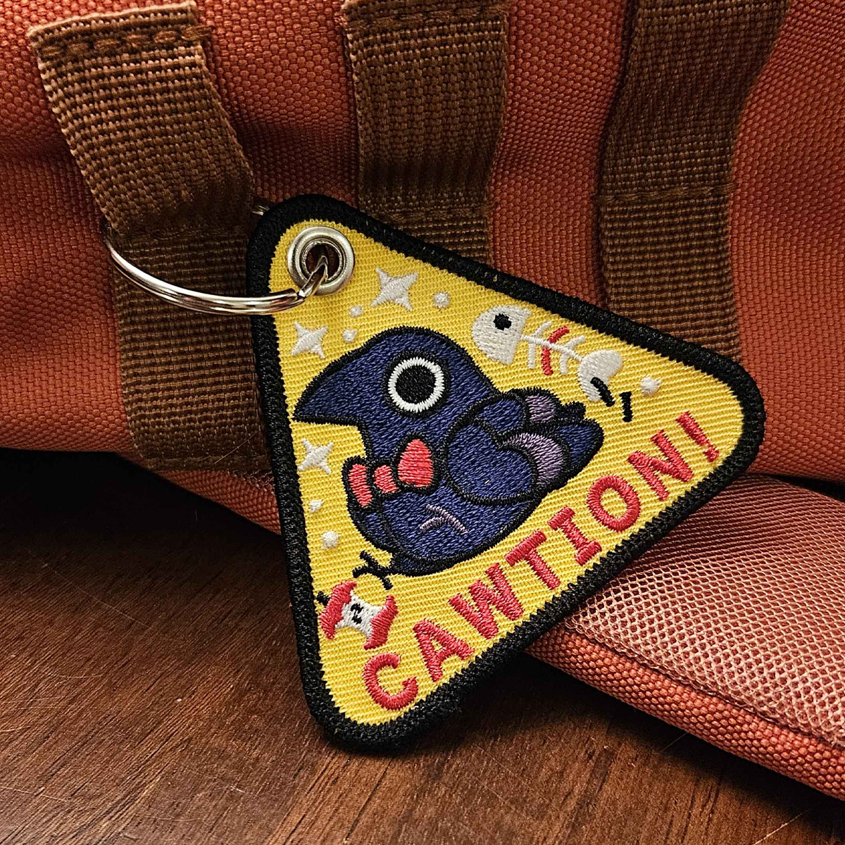 Cawtion Keychain