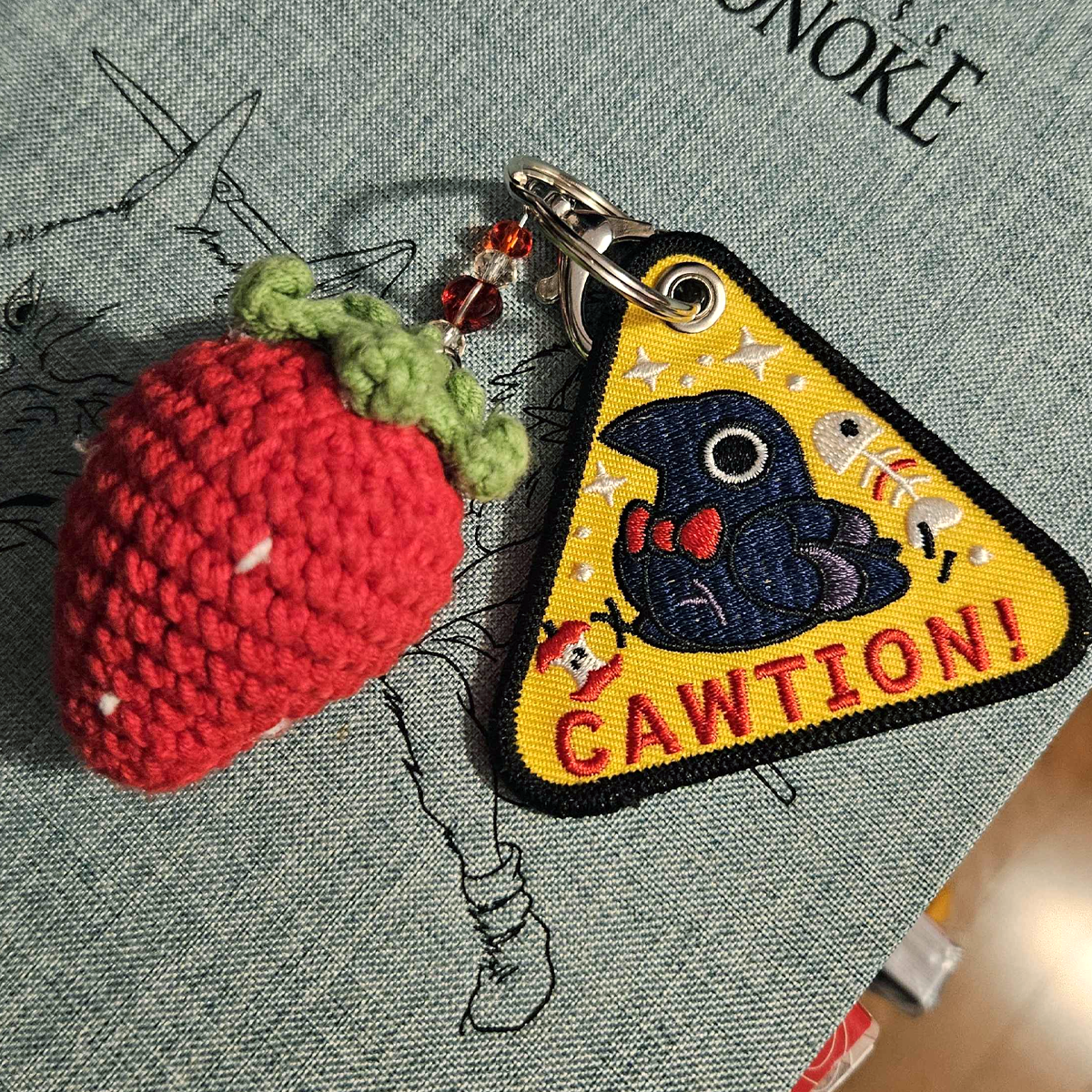 Cawtion Keychain