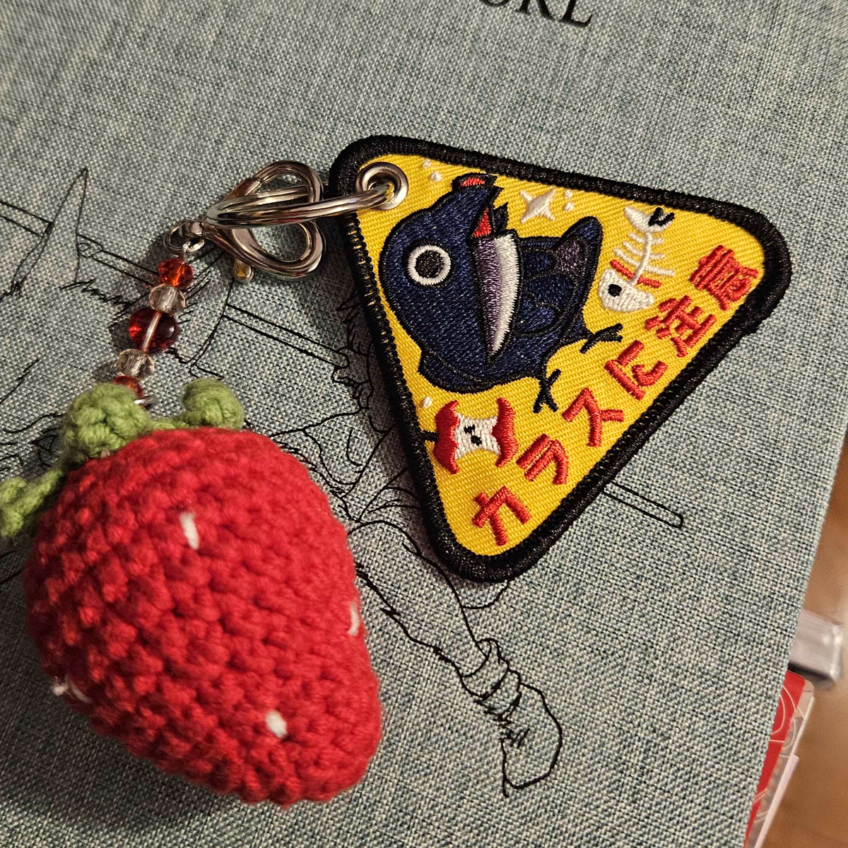 Cawtion Keychain